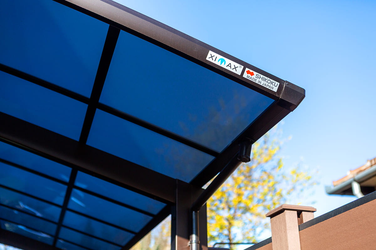 Ximax Portoforte alumínium kocsibeálló polikarbonát tetővel szűk udvarra